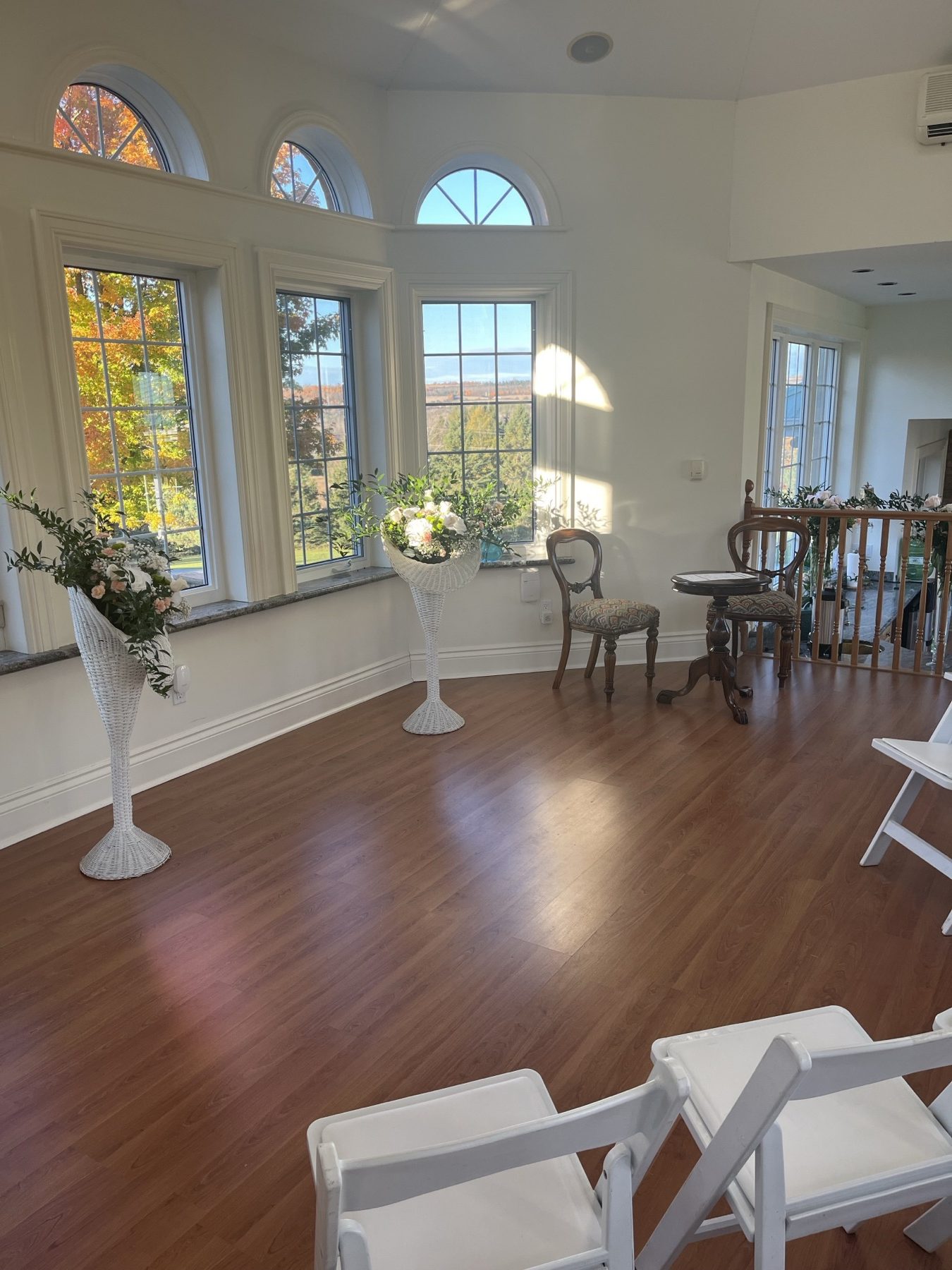 Atrium ceremony space with arched windows