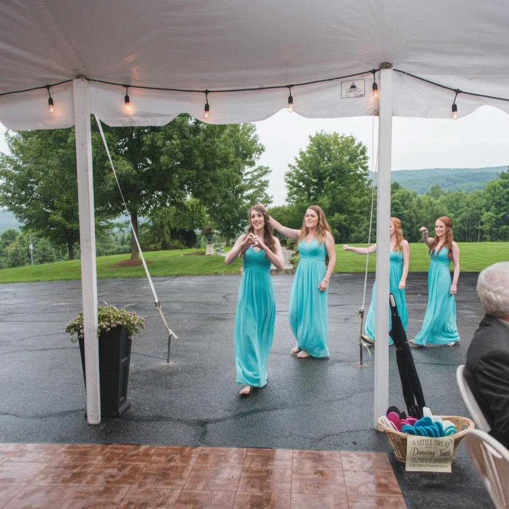 Bridesmaids walking beneath the reception tent with the house removed from the background