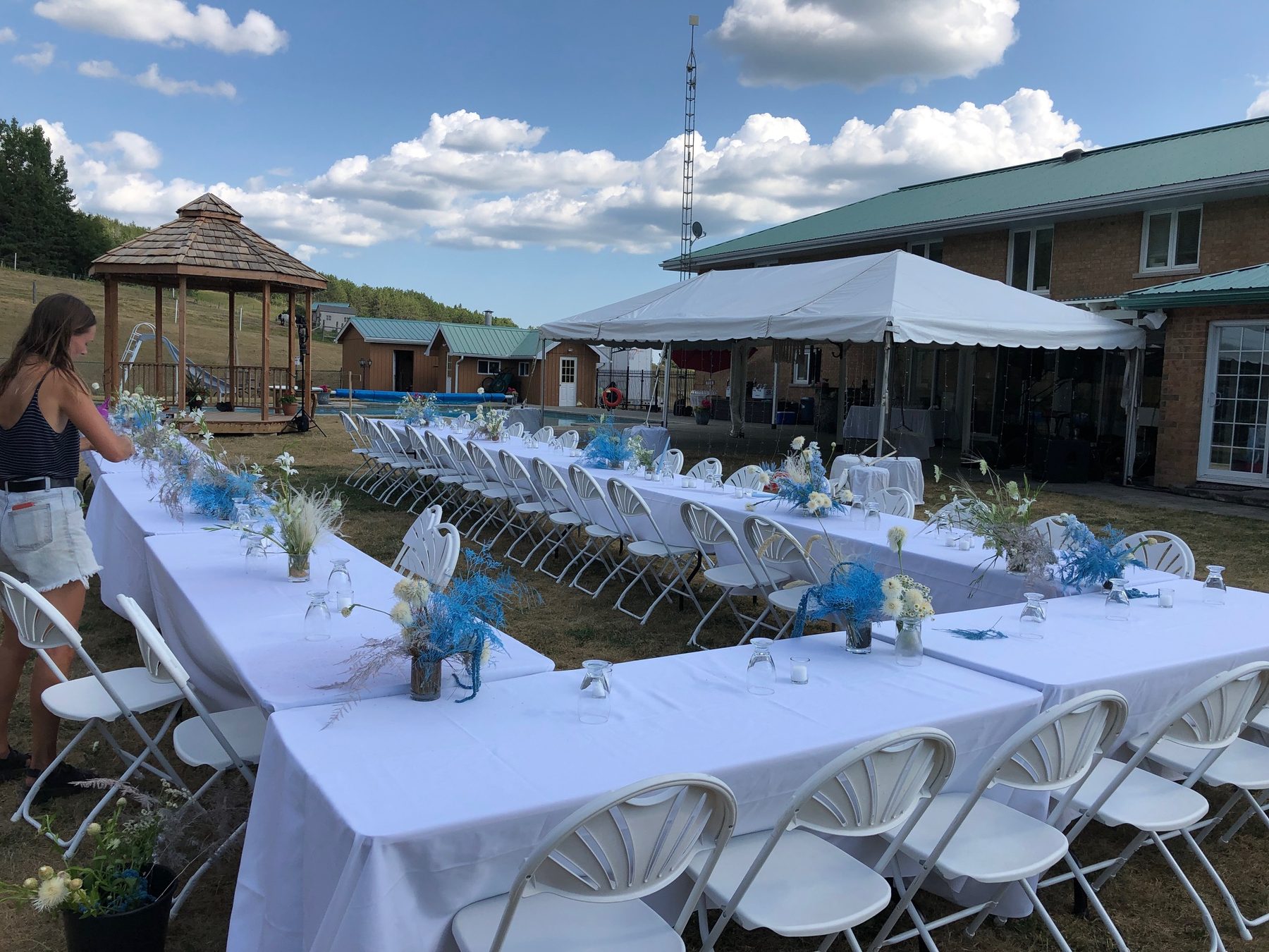 Reception tables set up in the backyard with no tent